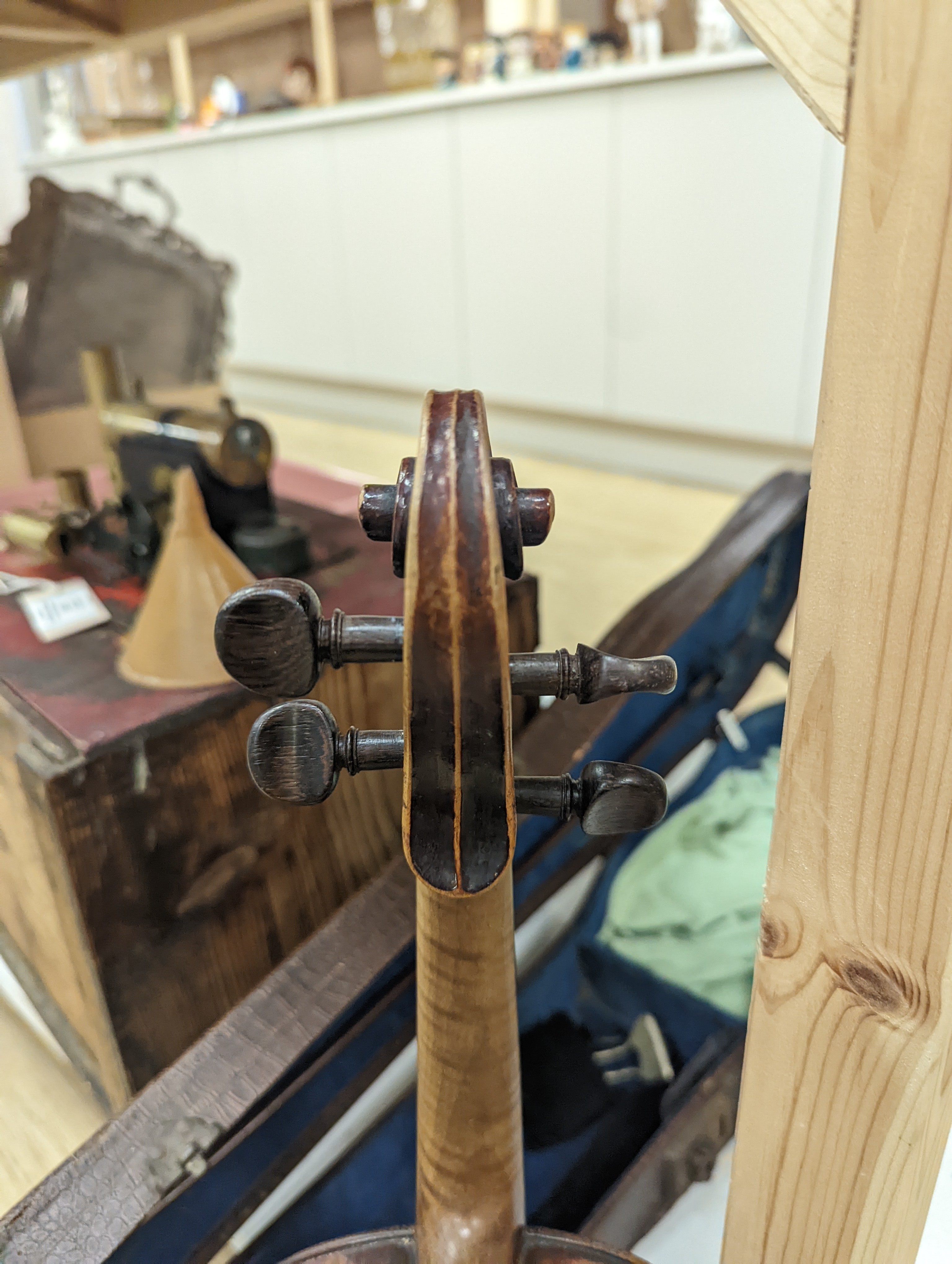 A late 19th century German violin and two bows, cased